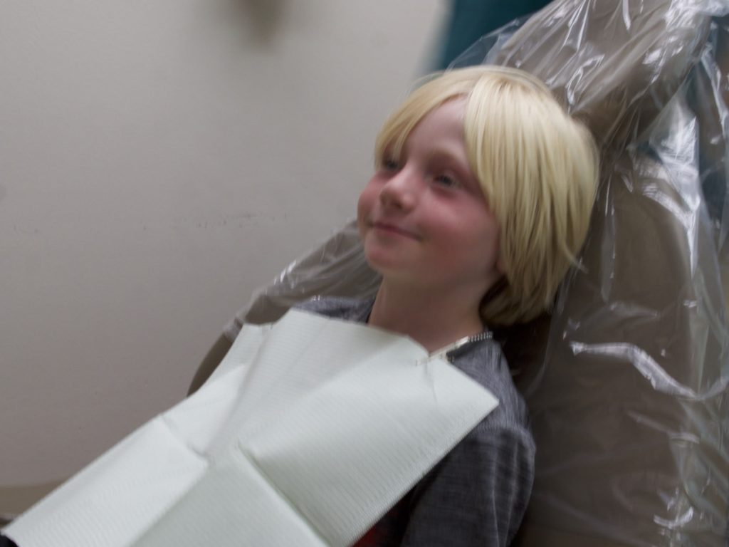 Young patient in chair Cashmere